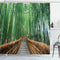 Rideau de douche motif allée de bambous géants dans une salle de bain