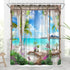 Rideau de douche motif balcon fleuri face au lagon dans une salle de bain