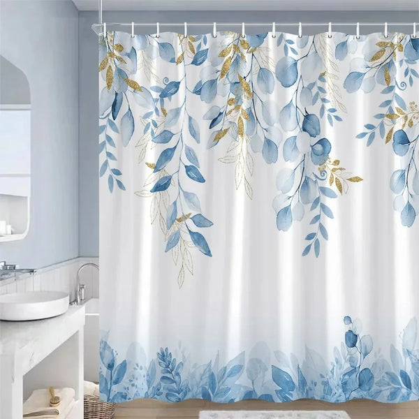 Rideau de douche motif feuilles bleues et dorées en encadrement dans une salle de bain