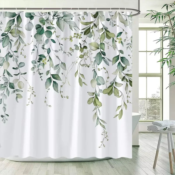 Rideau de douche motif guirlande de feuilles vert sauge dans une salle de bain