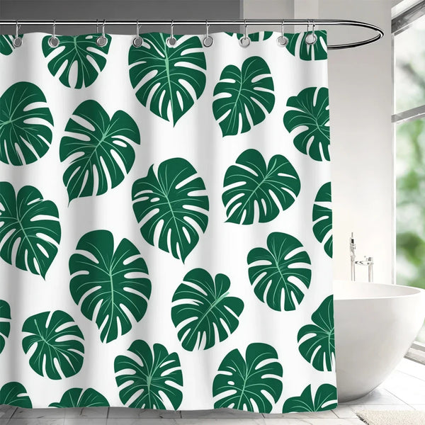 Rideau de douche motif feuilles de monstera vert foncé dans une salle de bain