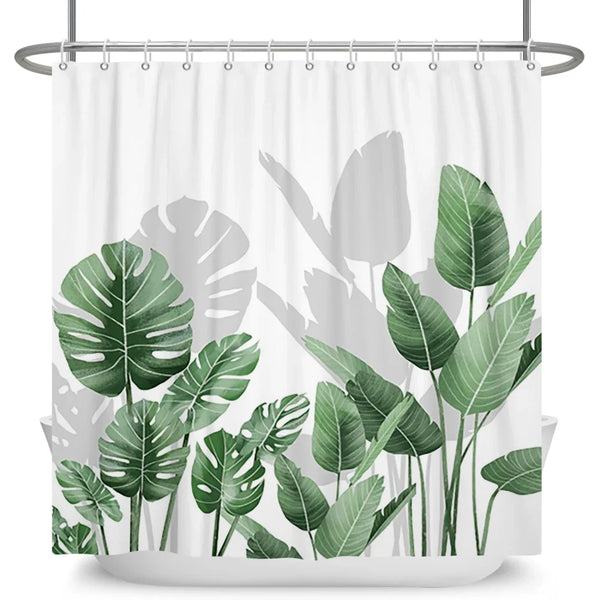Rideau de douche motif plantes tropicales vertes et ombres grises dans une salle de bain